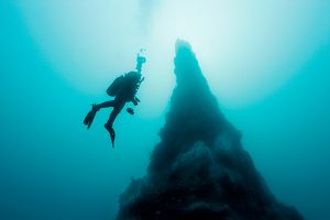 A diver at the top of Strýtan